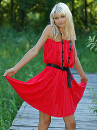 Find-Best-Pussy.com presents: Naughty teen appears in her sexy red dress and starts removing it passionately and moving slowly.