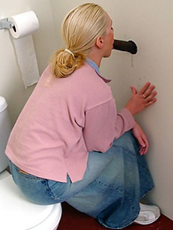 Find-Best-Pussy.com presents: Blonde girl Jamie sits on the toilet and blows a black gloryhole dong